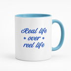 Kubek Real Life Over Reel Life
