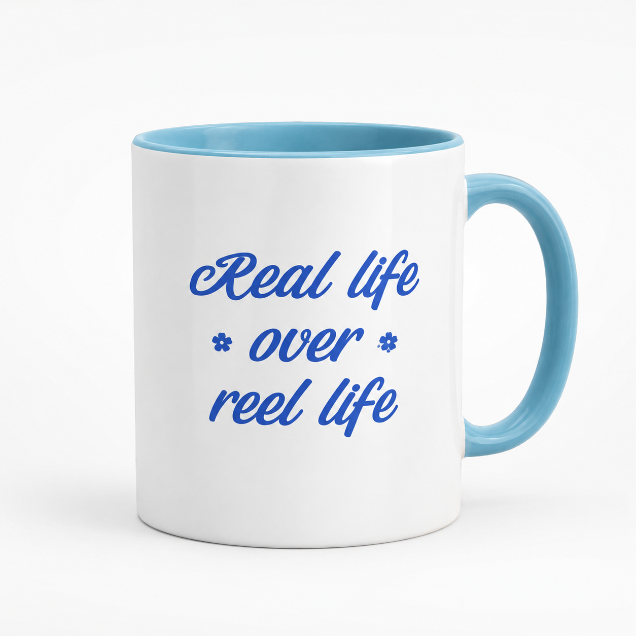 Kubek Real Life Over Reel Life